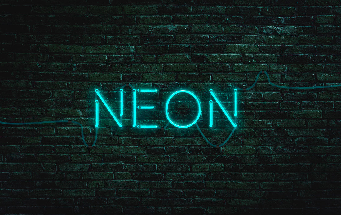 Neon sign composite on brick wall
